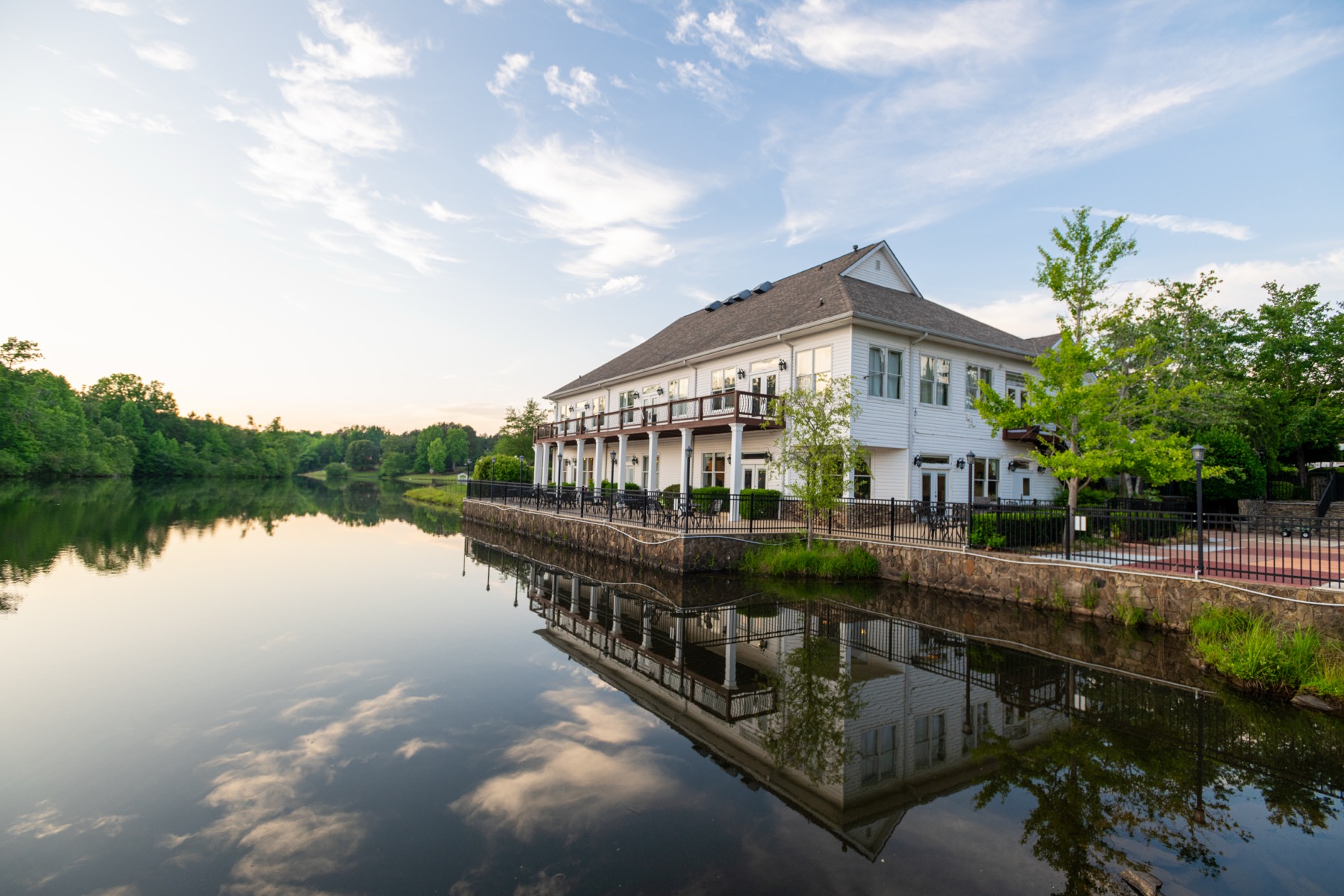 The convent reflected in the still lake at dawn